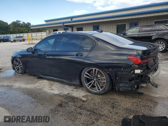 2022 BMW 7 Series 750i xDrive with VIN WBA7U2C01NCK83702, listed as a Copart auction lot 74327704 with Not provided miles and Salvage title. Bid and sale history available at DreamBid. Image 2.