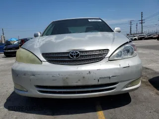 2004 Toyota Camry LE with VIN 4T1BE32K94U300544, listed as a Copart auction lot 60529005 with 223,940 mi miles and Clean title. Bid and sale history available at DreamBid. Image 5.