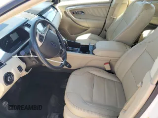 2015 Ford Taurus SEL z VIN 1FAHP2E8XFG181929, wystawiony jako Copart lot #64022325 z przebiegiem 106 272 mil mil oraz Szkoda całkowita • Salvage title. Historia ofert i sprzedaży dostępna na DreamBid. Obrazek 7.