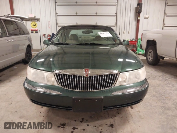 2001 Lincoln Continental with VIN 1LNHM97V11Y691910, listed as a IAAI auction lot 41501779 with 102,715 mi miles and . Bid and sale history available at DreamBid. Image 12.
