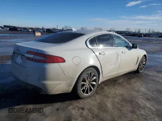 2015 Jaguar XF with VIN SAJXA0FS5FPU49437, listed as a Copart auction lot 84757254 with 99,301 mi miles and Salvage Title. Bid and sale history available at DreamBid. Image 3.