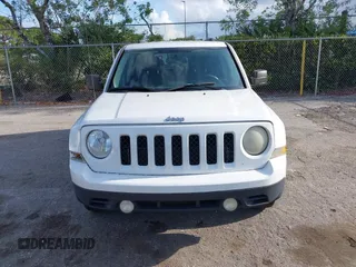 2014 Jeep Patriot Sport with VIN 1C4NJPBBXED671220, listed as a IAAI auction lot 42163245 with 216,848 mi miles. Bid and sale history available at carsss.com. Image 6.