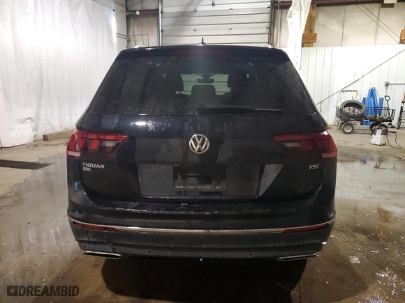 2018 Volkswagen Tiguan SEL Premium with VIN 3VV5B7AX7JM003594, listed as a Copart auction lot 80971744 with 79,898 mi miles and Salvage Title. Bid and sale history available at carsss.com. Image 6.