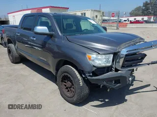 2012 Toyota Tundra z VIN 5TFEM5F11CX037027, wystawiony jako IAAI lot #42347370 z przebiegiem 231 128 mil mil oraz . Historia ofert i sprzedaży dostępna na DreamBid. Obrazek 1.