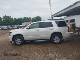 2015 Chevrolet Tahoe LTZ with VIN 1GNSCCKC1FR265370, listed as a IAAI auction lot 42131294 with 217,064 mi miles and . Bid and sale history available at DreamBid. Image 14.