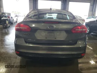 2017 Ford Focus SE with VIN 1FADP3F21HL205754, listed as a Copart auction lot 67166984 with 83,617 mi miles and Salvage title. Bid and sale history available at DreamBid. Image 6.