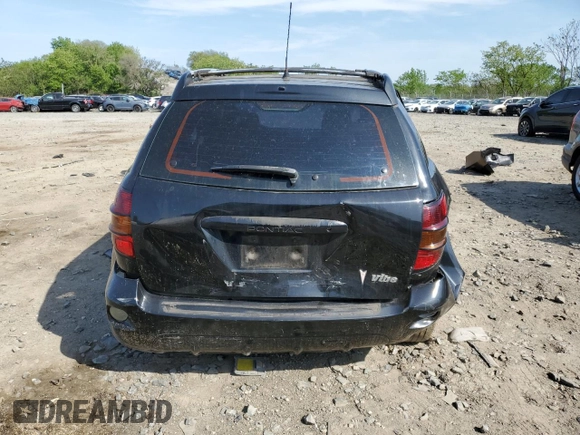 2003 Pontiac Vibe z VIN 5Y2SL62823Z462677, wystawiony jako Copart lot #54797925 z przebiegiem 210 973 mil mil oraz Szkoda całkowita • Salvage title. Historia ofert i sprzedaży dostępna na DreamBid. Obrazek 6.