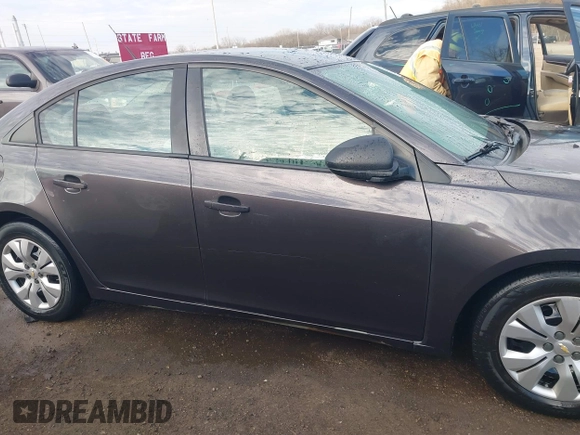 2014 Chevrolet Cruze LS with VIN 1G1PA5SH5E7436409, listed as a IAAI auction lot 41876578 with 210,863 mi miles and . Bid and sale history available at DreamBid. Image 12.