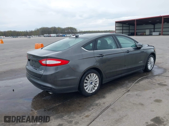 2015 Ford Fusion SE Hybrid with VIN 3FA6P0LU9FR232583, listed as a IAAI auction lot 42012175 with 139,309 mi miles and . Bid and sale history available at DreamBid. Image 4.