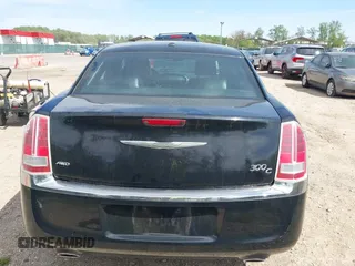 2013 Chrysler 300 with VIN 2C3CCAKG2DH645193, listed as a IAAI auction lot 42105459 with 230,063 mi miles. Bid and sale history available at carsss.com. Image 16.