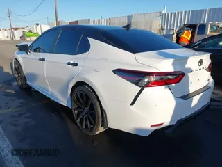 2023 Toyota Camry SE with VIN 4T1T11AK7PU835799, listed as a IAAI auction lot 41806697 with 30,609 mi miles. Bid and sale history available at carsss.com. Image 3.