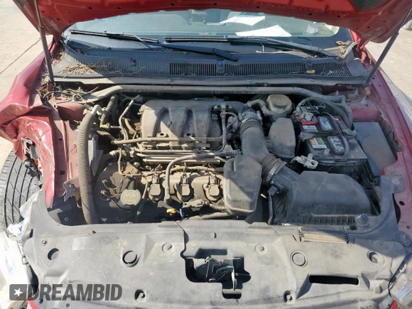 2014 Ford Taurus Limited with VIN 1FAHP2F89EG186567, listed as a Copart auction lot 61404285 with 188,890 mi miles and Salvage title. Bid and sale history available at DreamBid. Image 11.