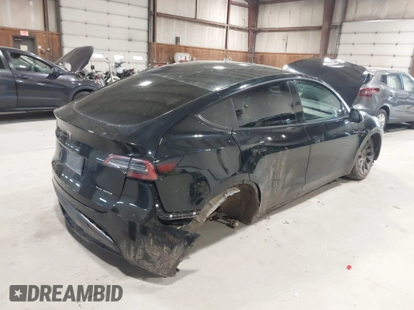 2022 Tesla Model Y Long Range z VIN 7SAYGDEE0NF342215, wystawiony jako IAAI lot #42136858 z przebiegiem 53 037 mil mil oraz . Historia ofert i sprzedaży dostępna na DreamBid. Obrazek 4.
