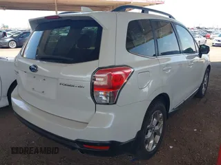 2018 Subaru Forester Touring z VIN JF2SJAWC6JH580632, wystawiony jako IAAI lot #42237986 z przebiegiem 38 446 mil mil oraz . Historia ofert i sprzedaży dostępna na DreamBid. Obrazek 4.