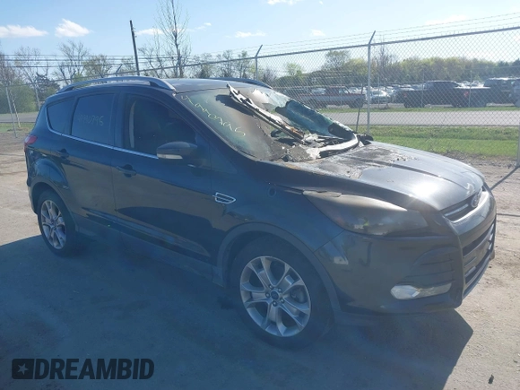 2015 Ford Escape Titanium with VIN 1FMCU9J94FUC33962, listed as a IAAI auction lot 41990795 with Not provided miles and . Bid and sale history available at DreamBid. Image 1.