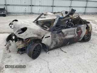 2006 MINI Convertible S z VIN WMWRH33536TK59031, wystawiony jako Copart lot #51598825 z przebiegiem Nie podano mil oraz Szkoda całkowita • Salvage title. Historia ofert i sprzedaży dostępna na DreamBid. Obrazek 1.