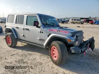 2021 Jeep Wrangler Unlimited Rubicon with VIN 1C4HJXFG0MW616829, listed as a Copart auction lot 61041425 with 128,724 mi miles and Salvage title. Bid and sale history available at DreamBid. Image 4.