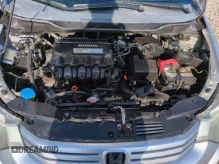 2010 Honda Insight LX with VIN JHMZE2H51AS011243, listed as a Copart auction lot 54445555 with 224,722 mi miles and Salvage Title. Bid and sale history available at DreamBid. Image 11.