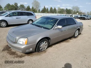 2001 Cadillac DeVille z VIN 1G6KD54YX1U242656, wystawiony jako Copart lot #54566105 z przebiegiem 200 016 mil mil oraz Szkoda całkowita • Salvage title. Historia ofert i sprzedaży dostępna na DreamBid. Obrazek 1.