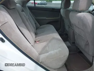 2004 Toyota Camry LE with VIN 4T1BE32K64U277496, listed as a IAAI auction lot 42130199 with 250,972 mi miles. Bid and sale history available at carsss.com. Image 8.