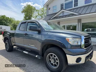 2010 Toyota Tundra with VIN 5TFUM5F19AX012899, listed as a IAAI auction lot 42841427 with 264,533 mi miles and . Bid and sale history available at DreamBid. Image 1.