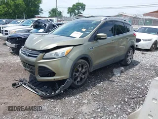 2014 Ford Escape Titanium с VIN 1FMCU0J93EUA92621, выставлен на аукционе IAAI как лот 42531195 с пробегом 170 423 миль миль и . История ставок и продаж доступна на DreamBid. Изображение 2.