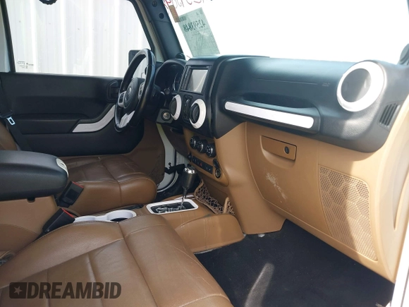 2012 Jeep Wrangler Unlimited Sahara with VIN 1C4BJWEG1CL186407, listed as a IAAI auction lot 42593848 with 178,354 mi miles and . Bid and sale history available at DreamBid. Image 5.