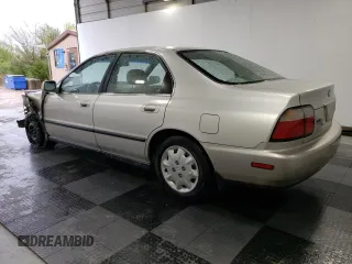 1997 Honda Accord LX with VIN JHMCD5630VC015585, listed as a Copart auction lot 52166155 with 121,820 mi miles and Salvage Title. Bid and sale history available at carsss.com. Image 2.