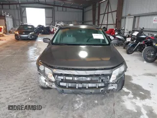 2012 Ford Fusion SE z VIN 3FAHP0HA9CR325249, wystawiony jako IAAI lot #41803339 z przebiegiem 203 650 mil mil oraz . Historia ofert i sprzedaży dostępna na DreamBid. Obrazek 12.