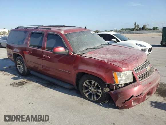 2013 Chevrolet Suburban LT with VIN 1GNSCJE08DR374024, listed as a Copart auction lot 54873375 with 141,206 mi miles and Salvage title. Bid and sale history available at DreamBid. Image 4.