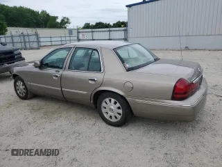2005 Mercury Grand Marquis LS Premium z VIN 2MEFM75W15X660639, wystawiony jako Copart lot #56580605 z przebiegiem 149 136 mil mil oraz Szkody całkowita. Historia ofert i sprzedaży dostępna na DreamBid. Obrazek 2.