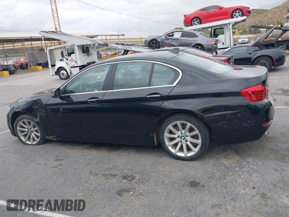 2015 BMW 5 Series 535i with VIN WBA5B1C55FD922761, listed as a IAAI auction lot 42021799 with 118,592 mi miles and . Bid and sale history available at carsss.com. Image 14.