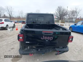 2022 Jeep Gladiator Rubicon with VIN 1C6JJTBG7NL145501, listed as a IAAI auction lot 41506842 with 20,593 mi miles and . Bid and sale history available at DreamBid. Image 16.