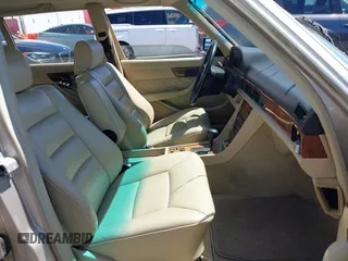 1989 Mercedes-Benz 560 with VIN WDBCA39D7KA436793, listed as a IAAI auction lot 42190980 with 141,165 mi miles and . Bid and sale history available at DreamBid. Image 5.