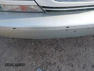 1999 Lexus RX 300 z VIN JT6HF10U2X0090375, wystawiony jako IAAI lot #41874552 z przebiegiem 179 885 mil mil oraz . Historia ofert i sprzedaży dostępna na DreamBid. Obrazek 16.