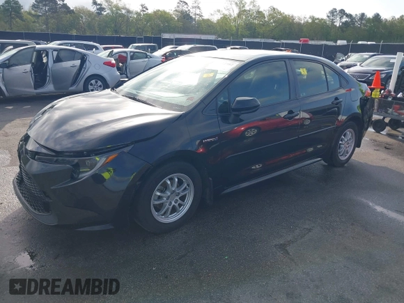 2021 Toyota Corolla Hybrid LE with VIN JTDEAMDE3MJ025426, listed as a IAAI auction lot 41922582 with 57,705 mi miles. Bid and sale history available at carsss.com. Image 19.