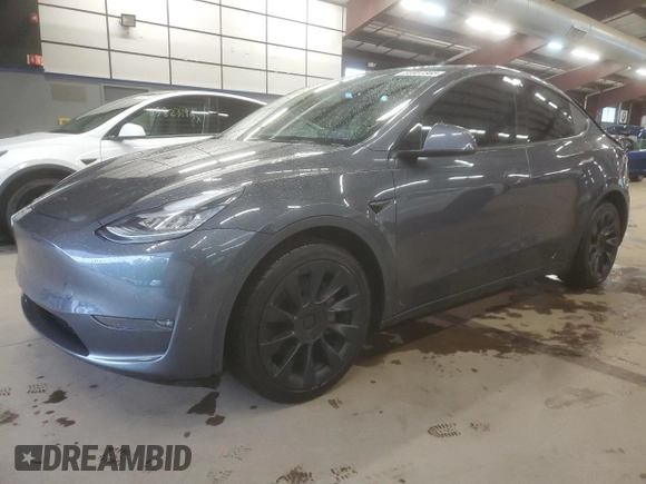 2021 Tesla Model Y Long Range with VIN 5YJYGDEE0MF076660, listed as a Copart auction lot 55957365 with 80,432 mi miles and Salvage Title. Bid and sale history available at DreamBid. Image 1.