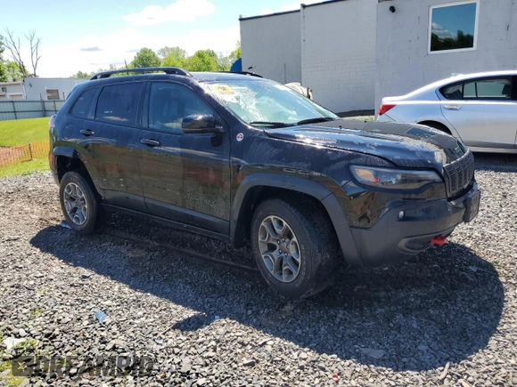 2022 Jeep Cherokee Trailhawk with VIN 1C4PJMBX8ND543366, listed as a Copart auction lot 55805195 with 61,926 mi miles and Salvage title. Bid and sale history available at DreamBid. Image 4.