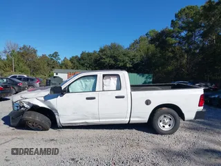 2021 Ram 1500 Tradesman with VIN 1C6RR6FT1MS563884, listed as a IAAI auction lot 40627614 with 64,269 mi miles and . Bid and sale history available at DreamBid. Image 14.
