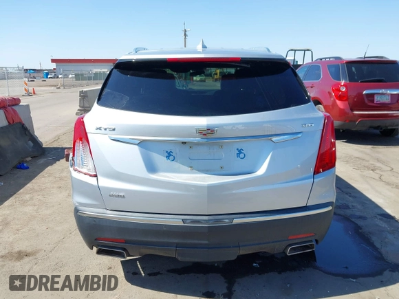 2017 Cadillac XT5 Luxury AWD z VIN 1GYKNDRS1HZ293429, wystawiony jako IAAI lot #42453704 z przebiegiem 92 347 mil mil oraz . Historia ofert i sprzedaży dostępna na DreamBid. Obrazek 16.