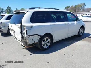 2016 Toyota Sienna LE AAS with VIN 5TDKK3DC0GS718129, listed as a IAAI auction lot 41818130 with 145,863 mi miles. Bid and sale history available at carsss.com. Image 4.