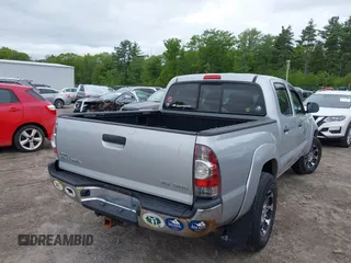 2011 Toyota Tacoma with VIN 3TMLU4EN4BM069898, listed as a IAAI auction lot 42371500 with 201,538 mi miles and . Bid and sale history available at DreamBid. Image 4.