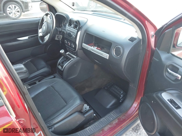 2016 Jeep Compass High Altitude Edition with VIN 1C4NJCEA9GD599487, listed as a IAAI auction lot 42087686 with 176,820 mi miles. Bid and sale history available at carsss.com. Image 5.