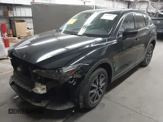 2018 Mazda CX-5 Grand Touring z VIN JM3KFADMXJ0311101, wystawiony jako IAAI lot #42163070 z przebiegiem 129 284 mil mil oraz . Historia ofert i sprzedaży dostępna na DreamBid. Obrazek 18.