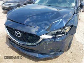 2018 Mazda 6 Sport with VIN JM1GL1UM7J1334658, listed as a IAAI auction lot 41938763 with 129,563 mi miles. Bid and sale history available at carsss.com. Image 6.