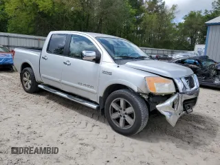 2010 Nissan Titan SE with VIN 1N6BA0ED2AN313022, listed as a Copart auction lot 51222275 with 137,640 mi miles and Salvage title. Bid and sale history available at DreamBid. Image 4.