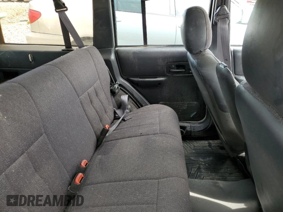 2000 Jeep Cherokee Classic с VIN 1J4FF58S7YL133399, выставлен на аукционе Copart как лот 61231845 с пробегом 196 499 миль миль и Списание • Salvage title. История ставок и продаж доступна на DreamBid. Изображение 10.