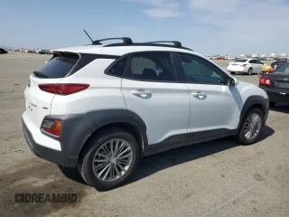 2019 Hyundai Kona SEL z VIN KM8K2CAA1KU351695, wystawiony jako Copart lot #59880505 z przebiegiem 65 279 mil mil oraz Szkoda całkowita • Salvage title. Historia ofert i sprzedaży dostępna na DreamBid. Obrazek 3.