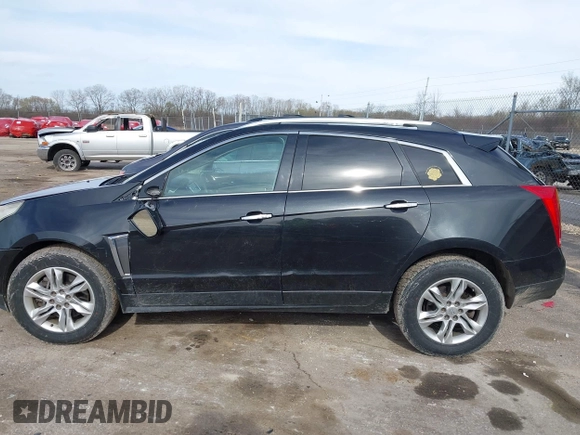 2013 Cadillac SRX Luxury Collection z VIN 3GYFNCE35DS607553, wystawiony jako IAAI lot #42151522 z przebiegiem 104 688 mil mil oraz . Historia ofert i sprzedaży dostępna na DreamBid. Obrazek 14.