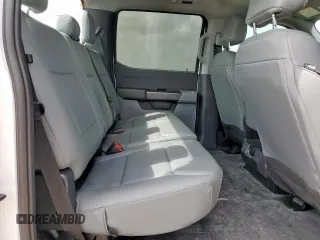 2023 Ford F-150 XL с VIN 1FTEW1CP9PKG21142, выставлен на аукционе Copart как лот 63073825 с пробегом 18 539 миль миль и Списание • Salvage title. История ставок и продаж доступна на DreamBid. Изображение 10.